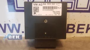 Module électronique central d'un Volkswagen Golf VI (5K1) 1.2 TSI BlueMotion 2011