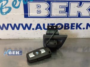 Used Electronic ignition key BMW 1 serie (E82) 118d 16V Price on request offered by Auto Bek