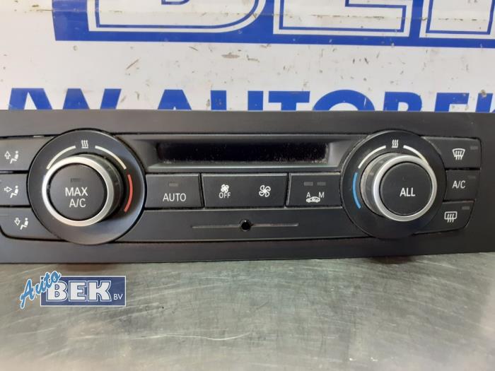 Heater control panel from a BMW 1 serie (E82) 118d 16V 2013