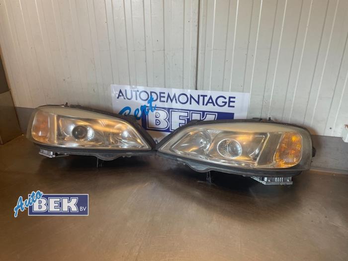 Set of headlight bulbs, left + right from a Opel Astra G (F08/48) 1.6 16V 2002