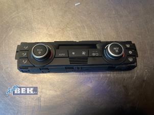 Used Heater control panel BMW 1 serie (E87/87N) 118d 16V Price € 25,00 Margin scheme offered by Auto Bek