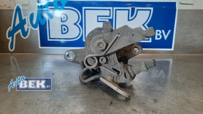 Rear brake calliper, left from a Volkswagen Golf VI (5K1) 1.2 TSI BlueMotion 2010