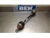 Front drive shaft, left from a Volkswagen Polo V (6R), 2009 / 2017 1.4 TDI DPF BlueMotion technology, Hatchback, Diesel, 1.422cc, 55kW (75pk), CUSA, 2014-03 2015