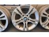 Set of sports wheels from a BMW 3 serie Compact (E46/5) 316ti 16V 2004