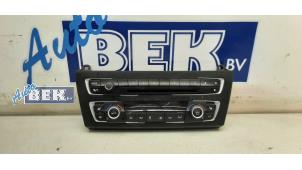 Used Heater control panel BMW 1 serie (F20) 118i 1.6 16V Price € 140,00 Margin scheme offered by Auto Bek