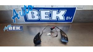 Used Steering wheel mounted radio control Fiat Doblo Cargo (263) 1.3 MJ 16V DPF Euro 5 Price on request offered by Auto Bek