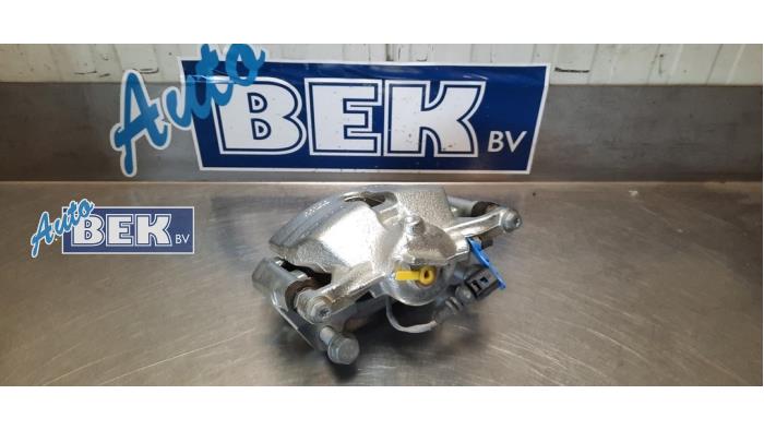 Front brake calliper, right from a Volkswagen Caddy IV 2.0 TDI 102 2018