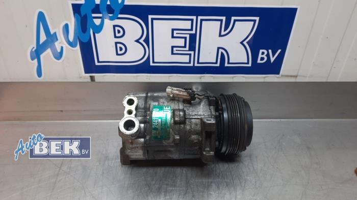 Air conditioning pump from a Opel Vectra C 1.8 16V 2002