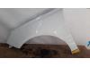 Front wing, left from a Peugeot 308 SW (L4/L9/LC/LJ/LR) 1.6 BlueHDi 120 2014