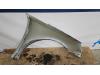 Front wing, left from a Peugeot 308 SW (L4/L9/LC/LJ/LR) 1.6 BlueHDi 120 2014