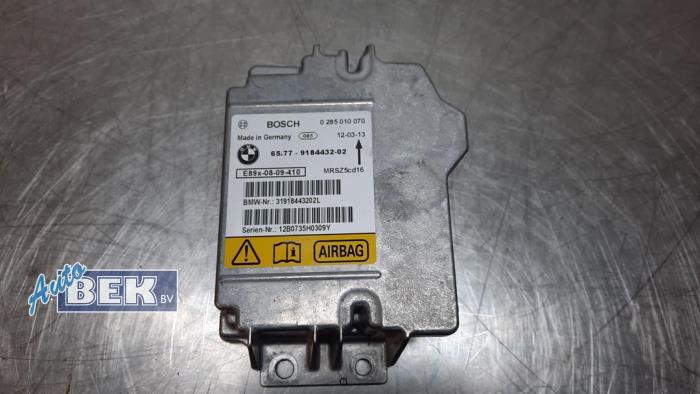Airbag Module from a BMW 1 serie (E82) 123d 16V 2012