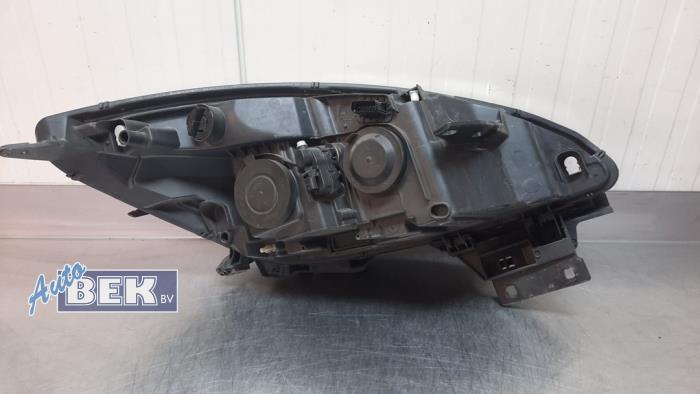 Scheinwerfer links van een Renault Scénic III (JZ) 1.5 dCi 110 2015