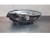 Headlight, left from a Renault Scénic III (JZ) 1.5 dCi 110 2015