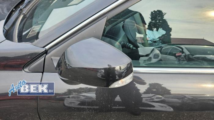 Wing mirror, left from a Renault Laguna III (BT) 1.5 dCi 110 2010