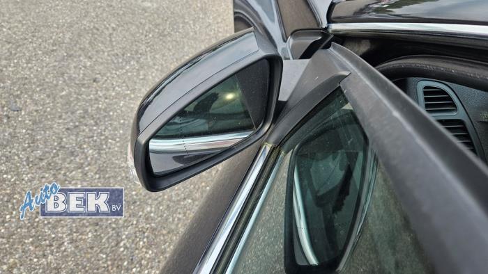 Wing mirror, left from a Renault Laguna III (BT) 1.5 dCi 110 2010