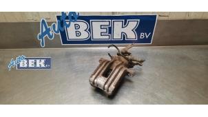 Usados Pinzas de freno izquierda detrás Volkswagen Golf V (1K1) 1.6 Precio € 35,00 Norma de margen ofrecido por Auto Bek