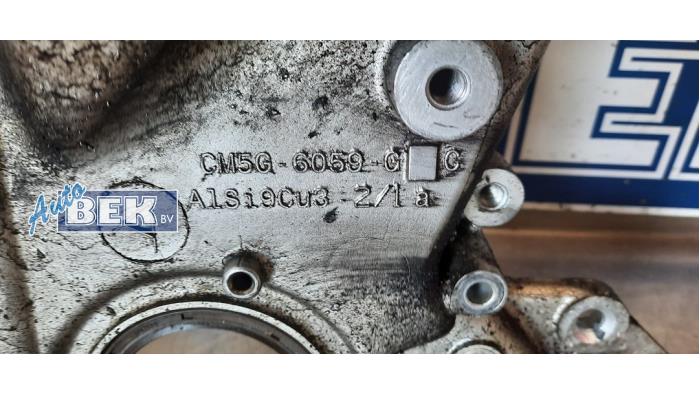 Timing cover from a Ford Fiesta 6 (JA8) 1.0 EcoBoost 12V 125 2013