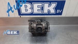 Usados Pinzas de freno izquierda detrás Volkswagen Golf VII (AUA) 1.6 TDI BMT 16V Precio € 95,00 Norma de margen ofrecido por Auto Bek