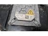 Headlight, left from a BMW X5 (E70) 3.0sd 24V 2008