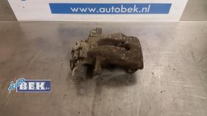 Used Rear brake calliper, left Opel Astra H SW (L35) 1.9 CDTi 100 Price € 24,99 Margin scheme offered by Auto Bek