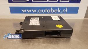 Usados Unidad de control multimedia Volkswagen Polo V (6R) 1.2 TDI 12V BlueMotion Precio € 125,00 Norma de margen ofrecido por Auto Bek