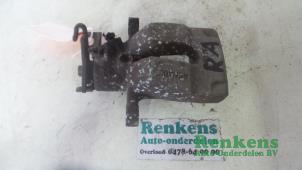 Used Rear brake calliper, right Renault Megane II CC (EM) 1.6 16V Price € 35,00 Margin scheme offered by Renkens Auto-Onderdelen B.V.