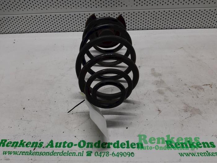 Rear coil spring from a Opel Astra H Twin Top (L67) 1.9 CDTi 16V 2008