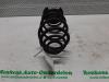 Rear coil spring from a Opel Astra H Twin Top (L67) 1.9 CDTi 16V 2008