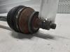 Front drive shaft, left from a Volkswagen Polo IV (9N1/2/3) 1.4 TDI 70 2007