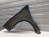 Front wing, right from a Opel Corsa B (73/78/79) 1.4i 1997