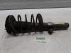 Front shock absorber rod, right from a Peugeot 206+ (2L/M) 1.4 XS 2009