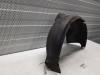 Wheel arch liner from a Volkswagen Polo III (6N2), 1999 / 2001 1.4 16V 75, Hatchback, Petrol, 1.390cc, 55kW (75pk), FWD, AHW, 1999-09 / 2001-09, 6N2 2000