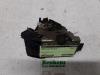 Ford Focus 1 1.4 16V Mechanizm blokady drzwi prawych wersja 2-drzwiowa