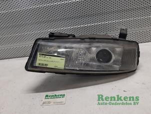 Używane Reflektor lewy Opel Calibra 2.0i Cena € 35,00 Procedura marży oferowane przez Renkens Auto-Onderdelen B.V.