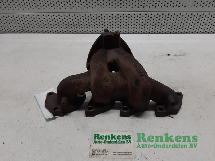 Exhaust manifold from a Opel Corsa B (73/78/79) 1.2i 16V 1999