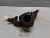 Exhaust manifold from a Opel Corsa B (73/78/79) 1.2i 16V 1999