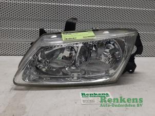 Used Headlight, left Nissan Almera (N16) 1.5 16V Price € 35,00 Margin scheme offered by Renkens Auto-Onderdelen B.V.