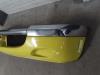Front bumper from a Daihatsu Sirion/Storia (M1) 1.0 12V 2000