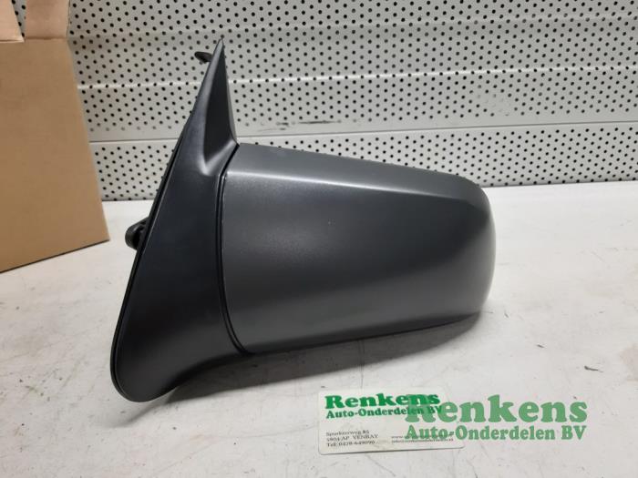 Wing mirror, left from a Opel Vectra A (86/87) 1.6 i 1993