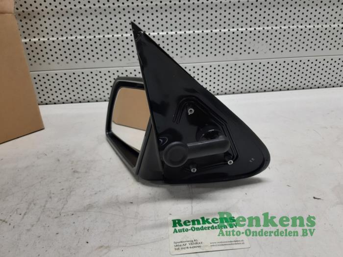 Wing mirror, left from a Opel Vectra A (86/87) 1.6 i 1993