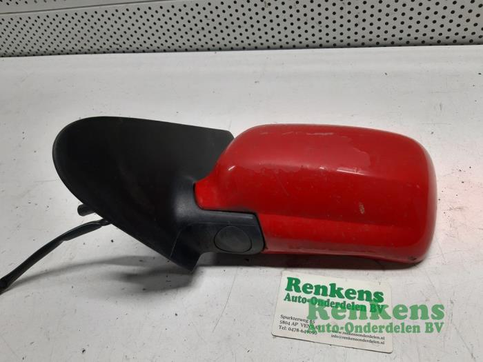 Wing mirror, left from a Volkswagen Polo III (6N1) 1.4i 60 1999