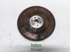 Flywheel from a Opel Astra H (L48) 1.6 16V Twinport 2004