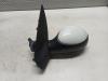 Wing mirror, left from a Peugeot 206+ (2L/M) 1.1 XR,XS 2012