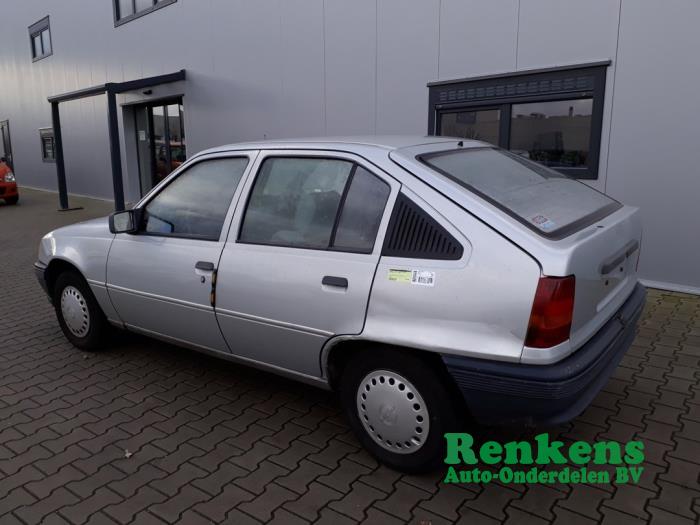 Rear door 4-door, left from a Opel Kadett E (33/34/43/44) 1.2 S,LS 1986