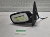 Wing mirror, left from a Toyota Yaris (P1), 1999 / 2005 1.3 16V VVT-i, Hatchback, Petrol, 1.299cc, 63kW (86pk), FWD, 2NZFE; 2SZFE, 1999-08 / 2005-11, NCP10; NCP20; NCP22; SCP12 2001