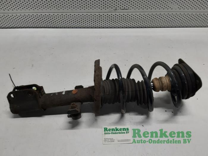 Front shock absorber rod, left from a Renault Clio III (BR/CR) 1.5 dCi FAP 2011