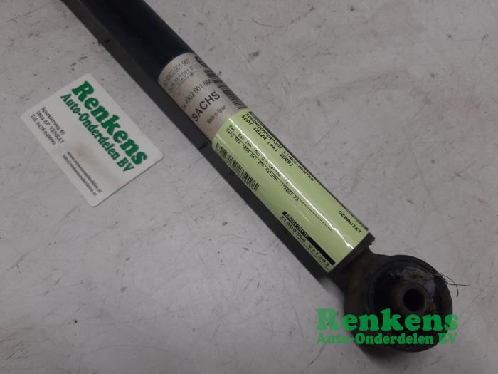 Rear shock absorber rod, left from a Seat Ibiza IV SC (6J1) 1.9 TDI 90 2009