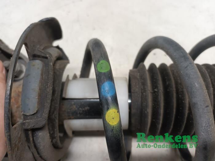 Front shock absorber rod, left from a Ford Fiesta 6 (JA8) 1.0 EcoBoost 12V 125 2015