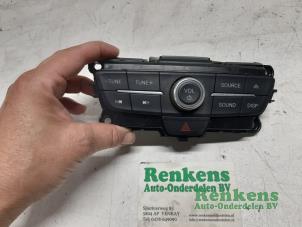 Used Radio control panel Ford Focus 3 1.0 Ti-VCT EcoBoost 12V 125 Price € 30,00 Margin scheme offered by Renkens Auto-Onderdelen B.V.
