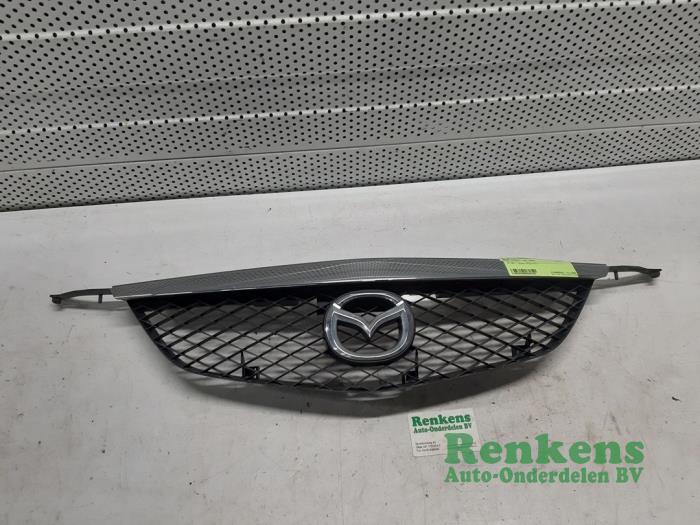 Używane Grill Mazda Premacy 1.8 16V Cena € 25,00 Procedura marży oferowane przez Renkens Auto-Onderdelen B.V.